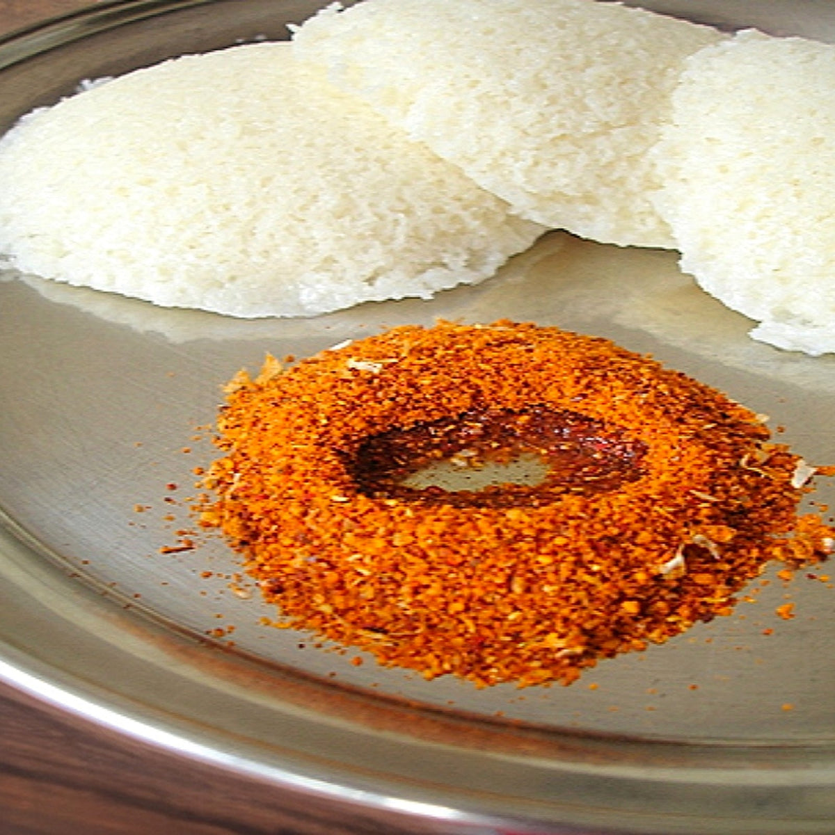 JĀTARAO Thippatheega Karam Podi colour product close-up