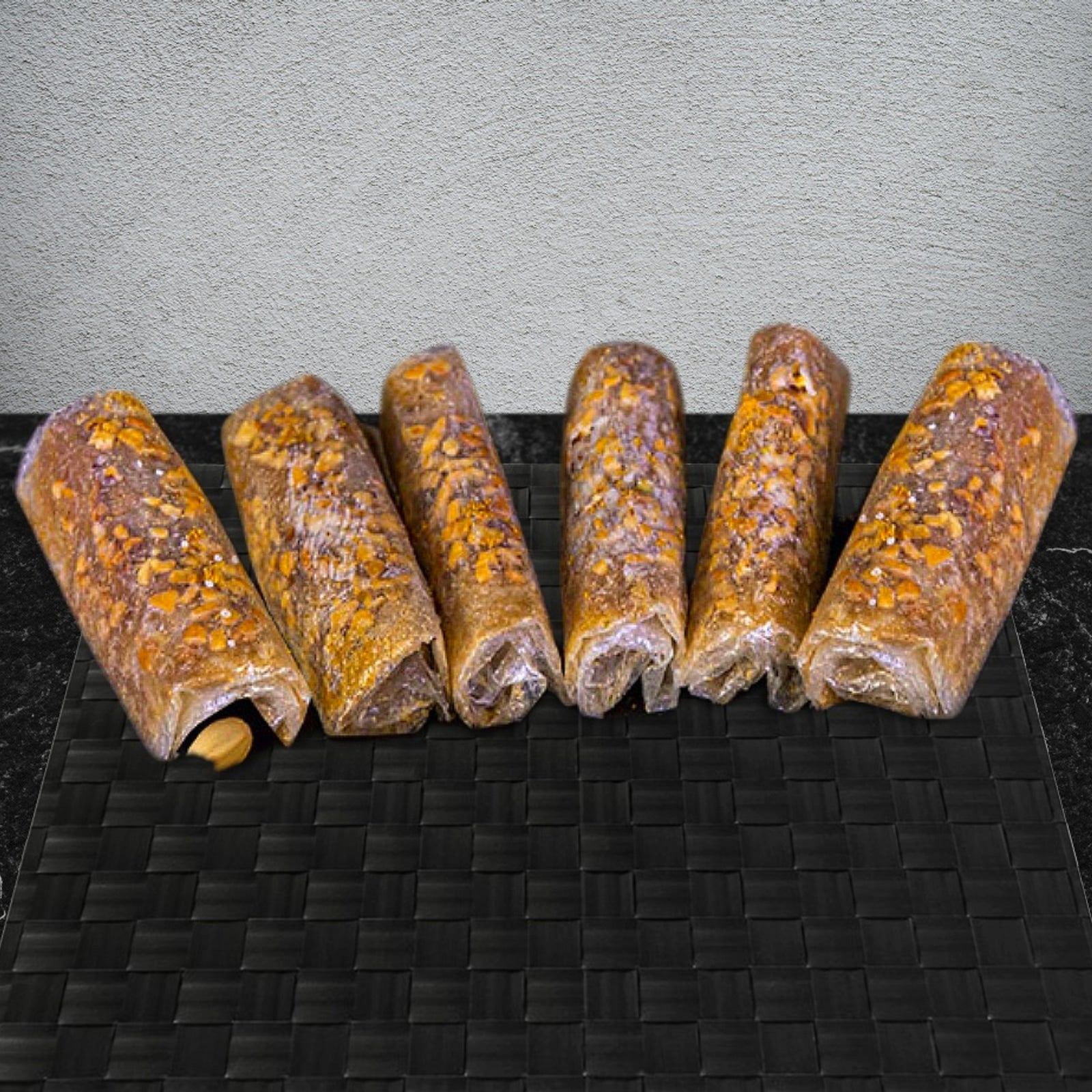 JĀTARAO Anakapalli Bellam Dry Fruit Pootharekulu colour product close-up